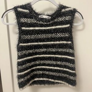 Striped wool vest with silver tinsel details.